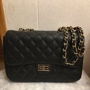 Black quilted vegan leather flap bag with gold woven chain strap